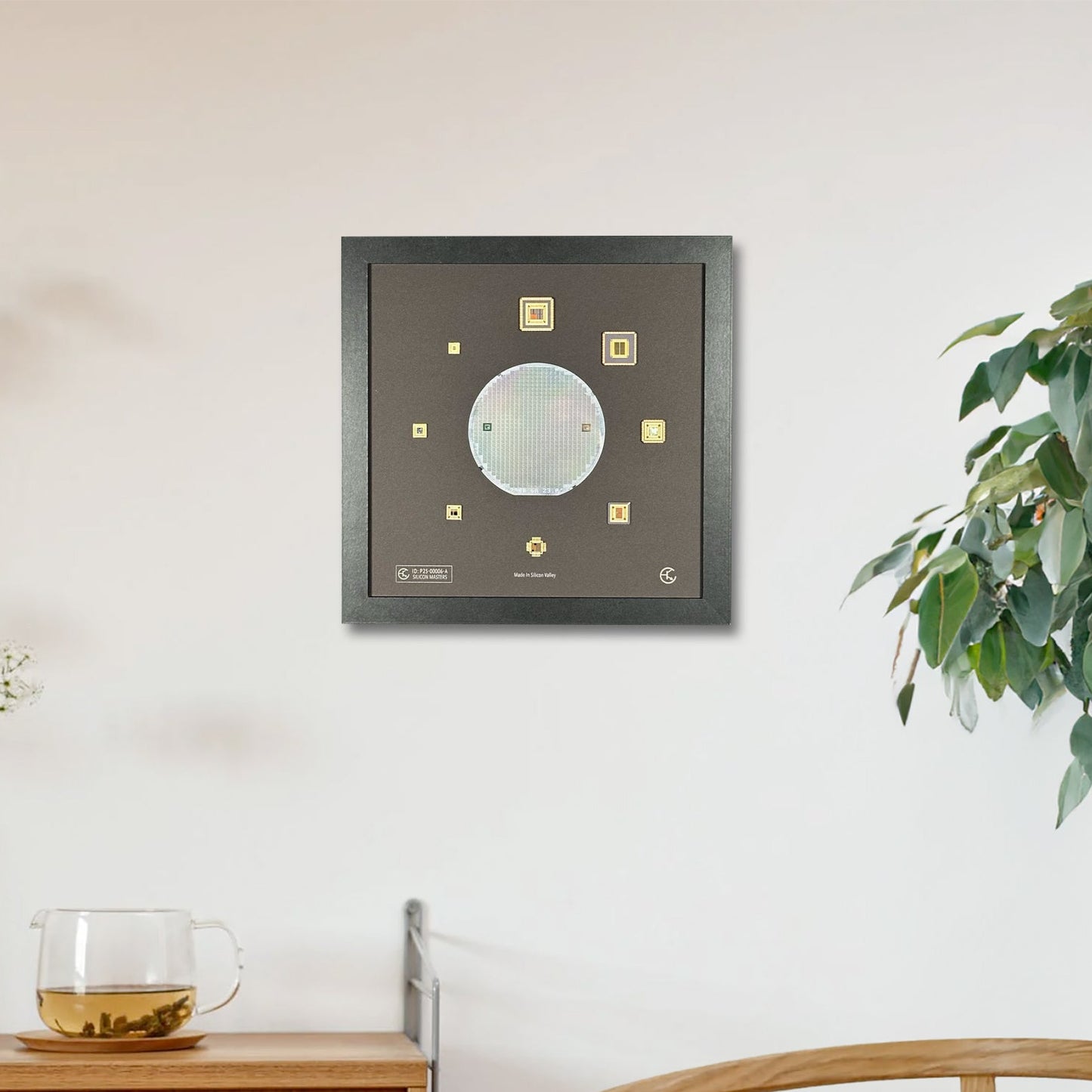 Decorative wall art piece with geometric design in a room with a wooden cabinet and plant.