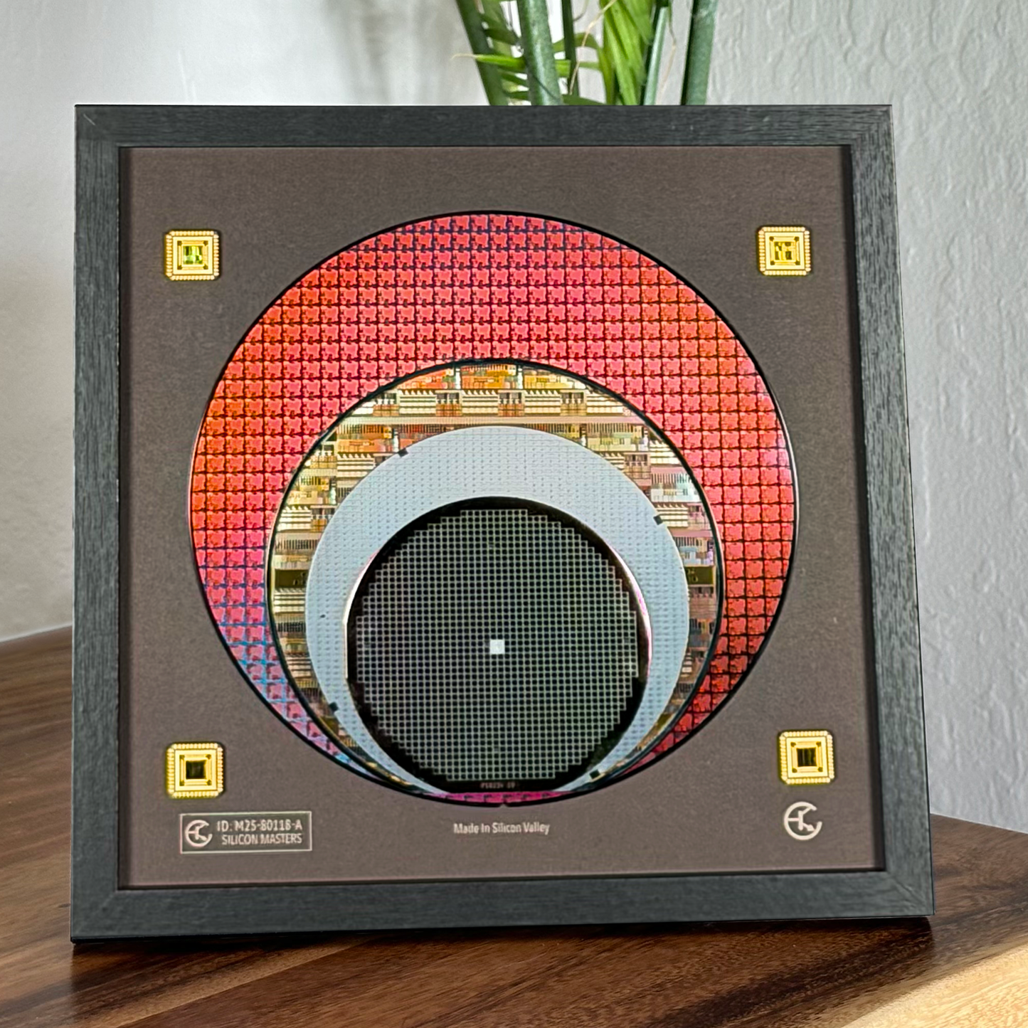 Close-up silicon wafer evolution 100-200mm framed semiconductor art detail
