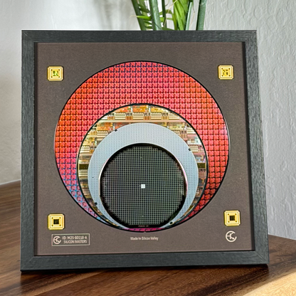 Close-up silicon wafer evolution 100-200mm framed semiconductor art detail