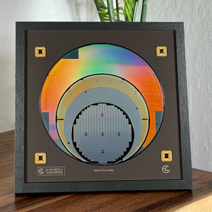 Close-up silicon wafer evolution 100-200mm framed semiconductor art detail