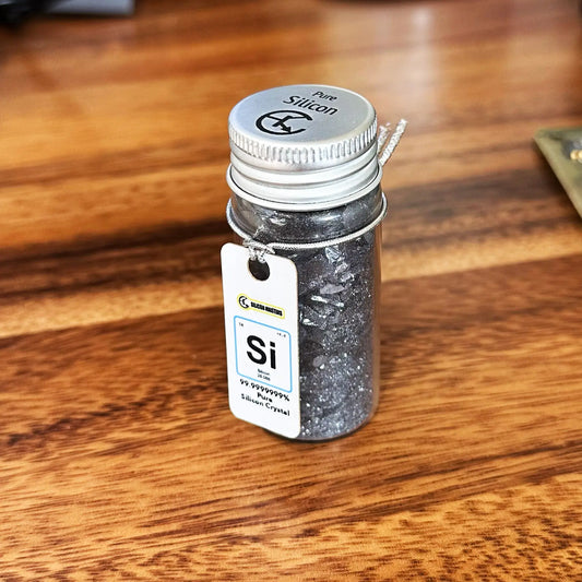 Vial of silicon crystal 99.9999999 percent pure from silicon ingot Silicon Masters desk art