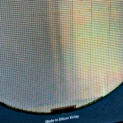 Close-up 200mm iridescent silicon wafer surface multicolor framed detail